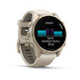 Fēnix® 8 – 43 mm AMOLED Soft Gold with Fog Gray/Dark Sandstone Band